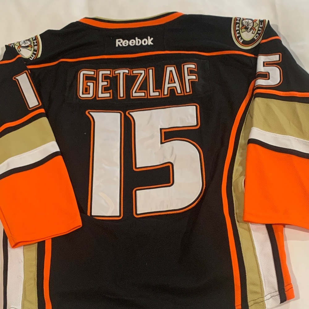 Reebok Black and Orange Sports Jersey